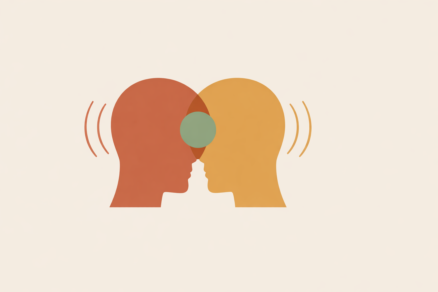Coach using NLP communication skills while listening to a focused client in a calm office setting